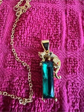 Gold-Tone Panther Pendant Necklace with Emerald Green Stone